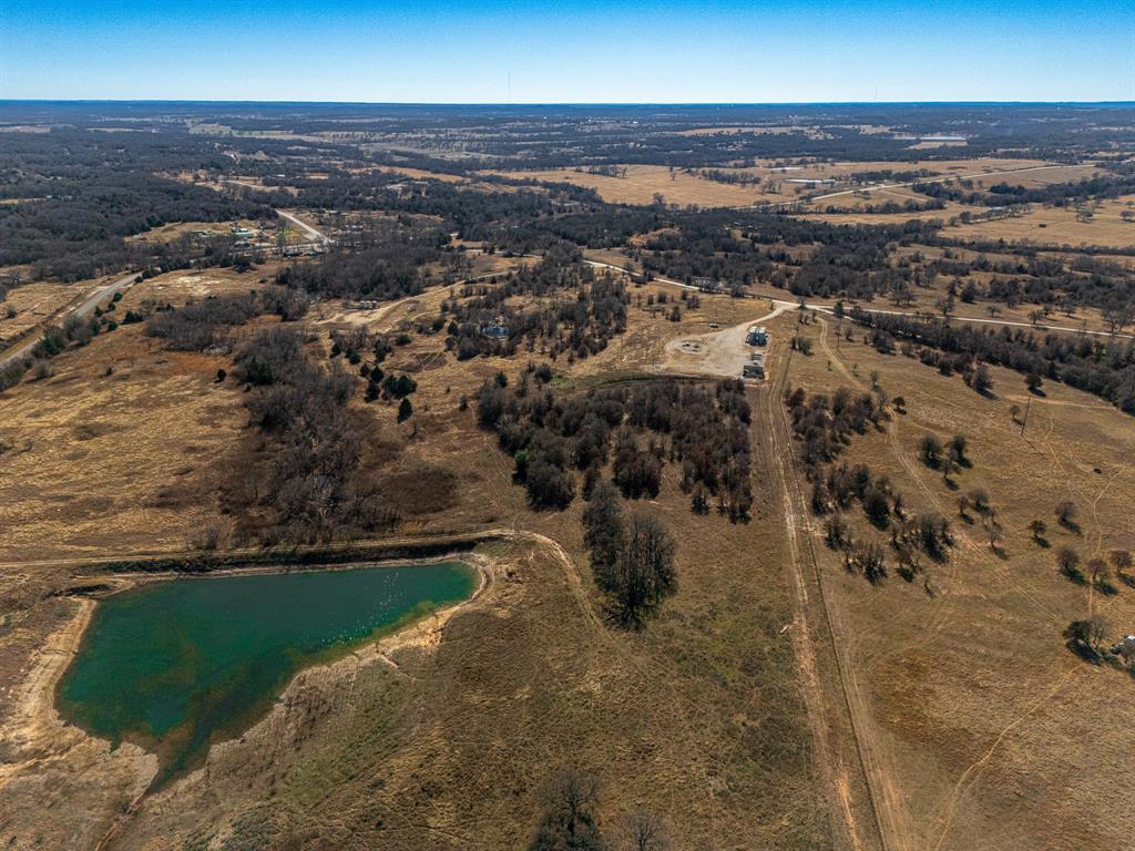 6 Lazy E Road St. Jo, TX 76265 - Photo 26 of 34 an aerial view of residential building and ocean