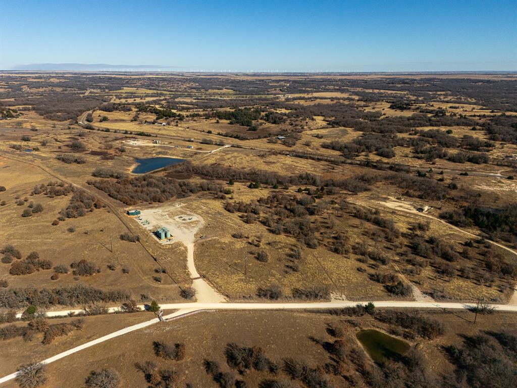 6 Lazy E Road St. Jo, TX 76265 - Photo 30 of 34 an aerial view of residential building with ocean view
