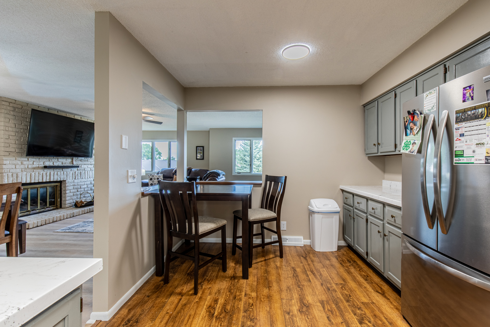 973 Innsbruck Lane, Unit 4G Princeton, IL 61356 - Photo 9 of 15 a view of a dining room with furniture and a flat screen tv