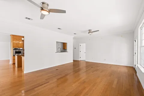 a kitchen with stainless steel appliances granite countertop a stove microwave and refrigerator