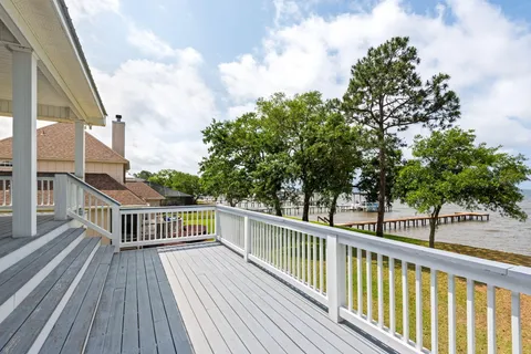 a view of a hall with wooden floor