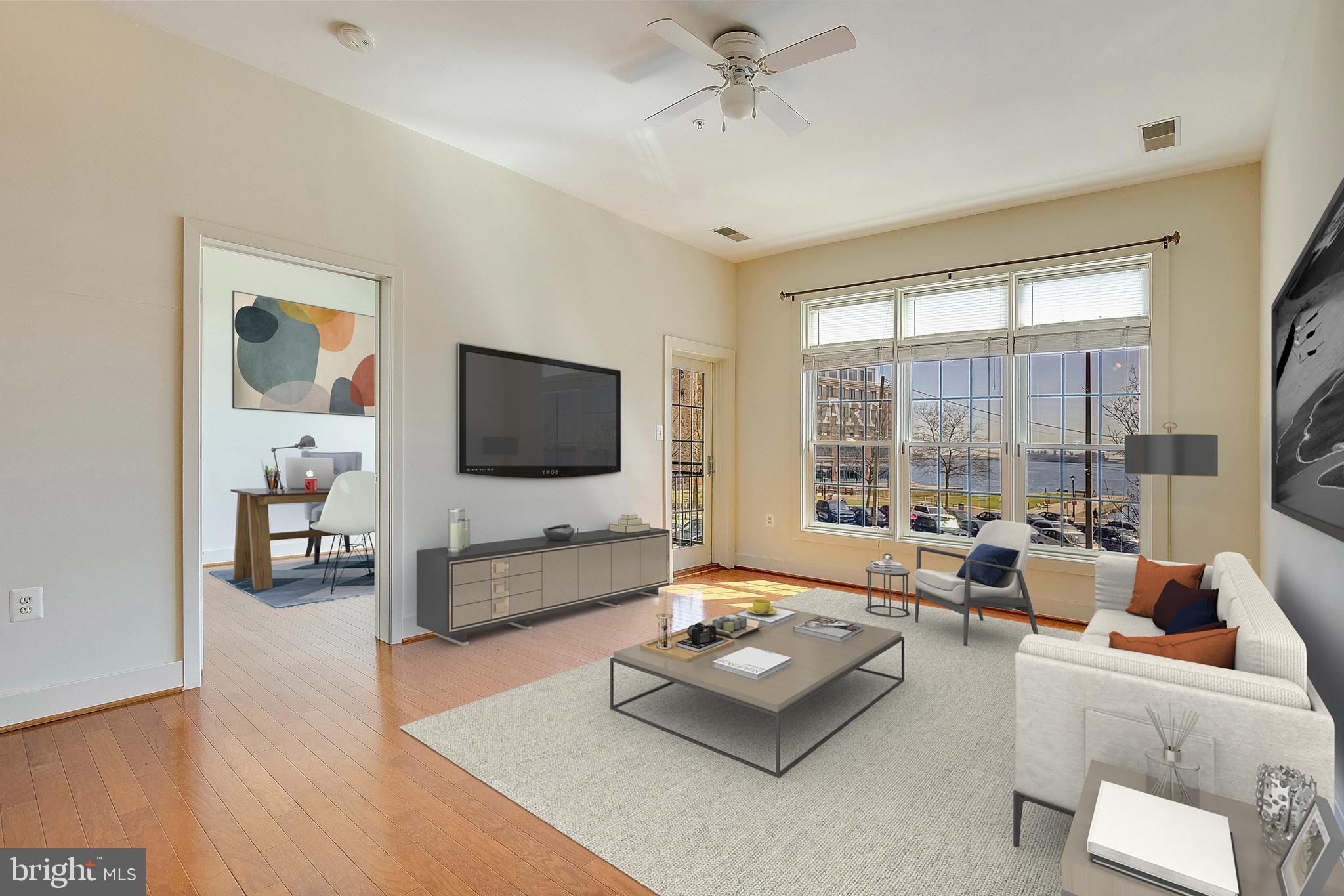 1500 Thames Street, Unit 203 Baltimore, MD 21231 - Photo 1 of 23 Family room overlooking the Harbor