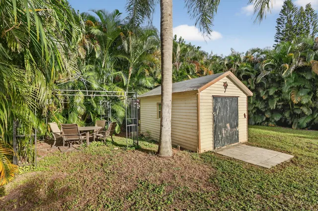a view of a backyard with a house