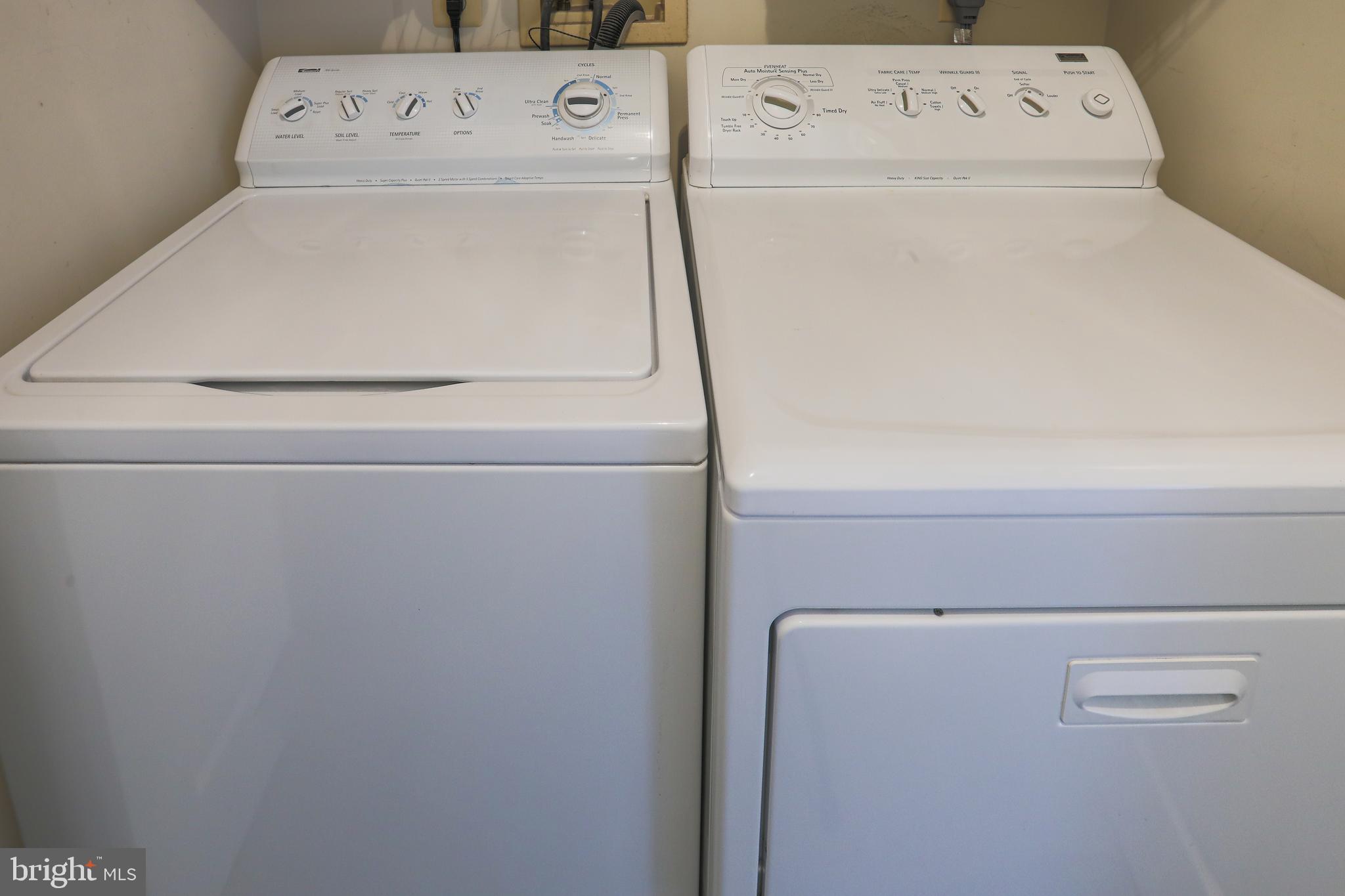 9547 Hallhurst Road Baltimore, MD 21236 - Photo 42 of 49 a close up of a washer and dryer