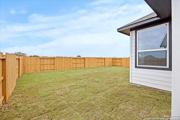 a house view with a garden space