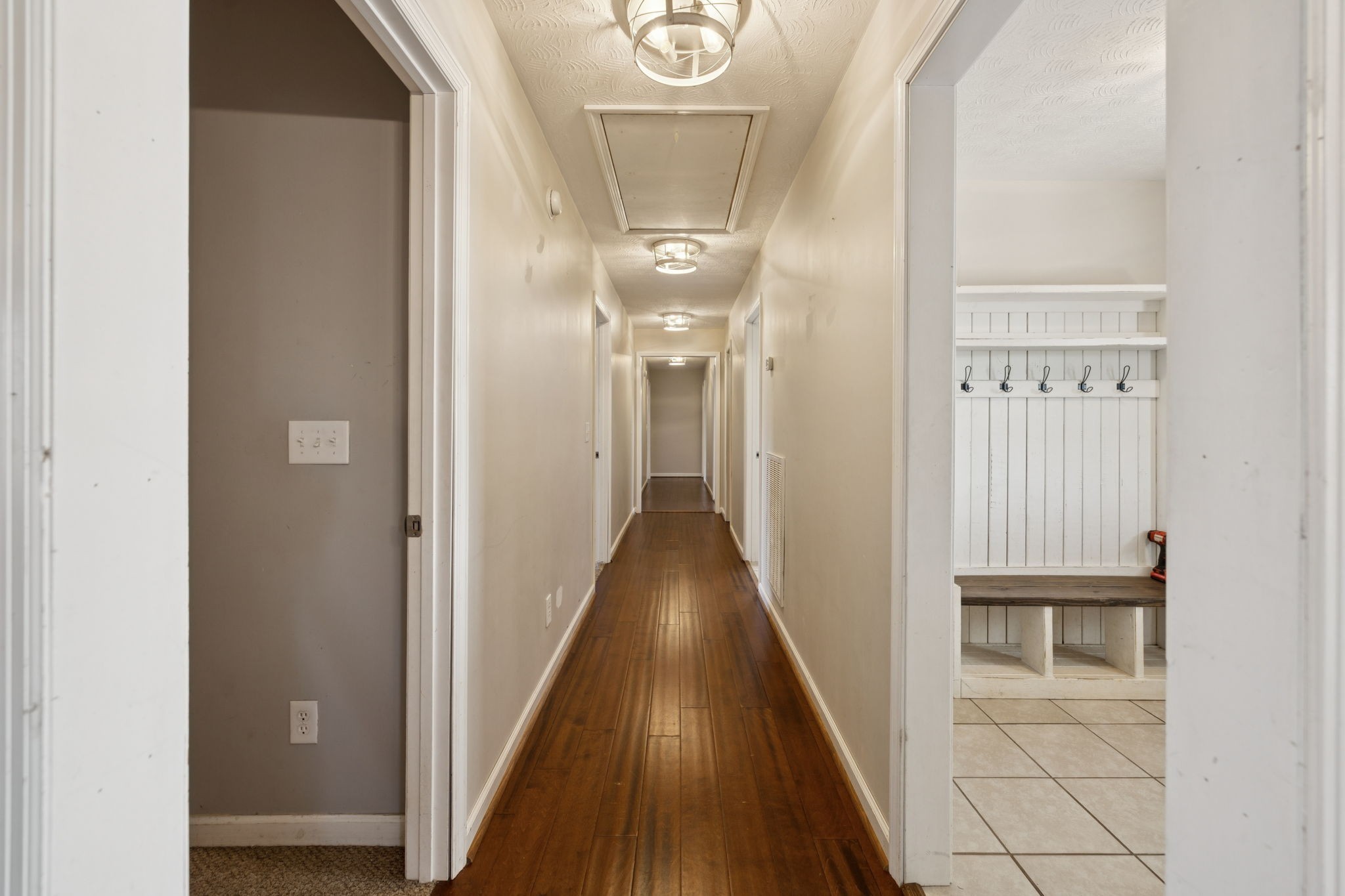 800 Williams Road Lafayette, TN 37083 - Photo 12 of 49 a view of a hallway with wooden floor