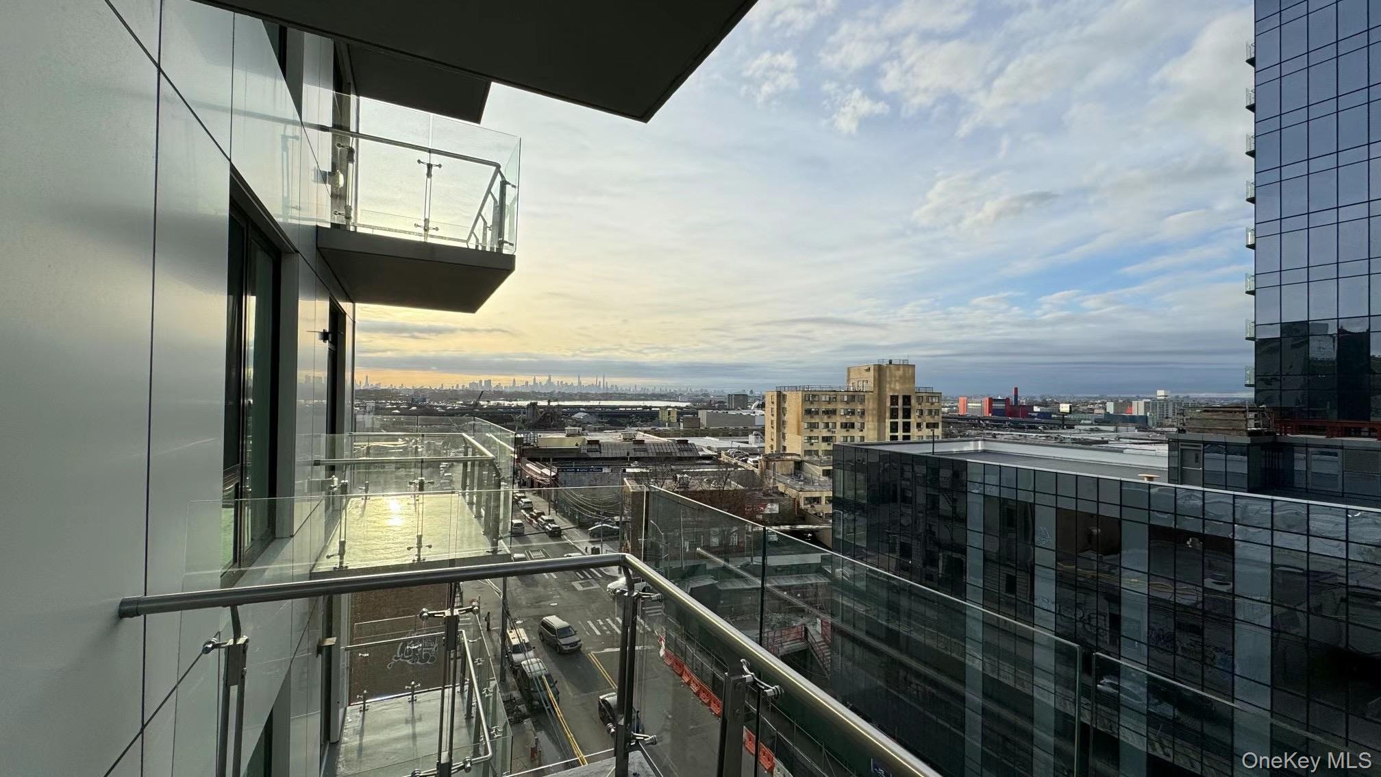 134-16 35th Avenue, Unit 6B Queens, NY 11354 - Photo 4 of 9 a view of a balcony with city view