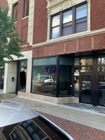 a view of outdoor space with wooden floor and flat screen tv