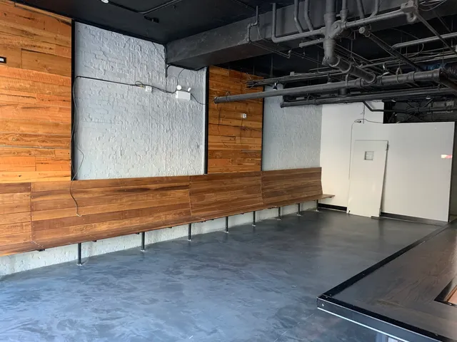 a view of a kitchen with a sink