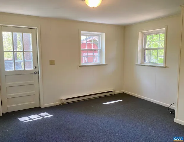 an empty room with windows