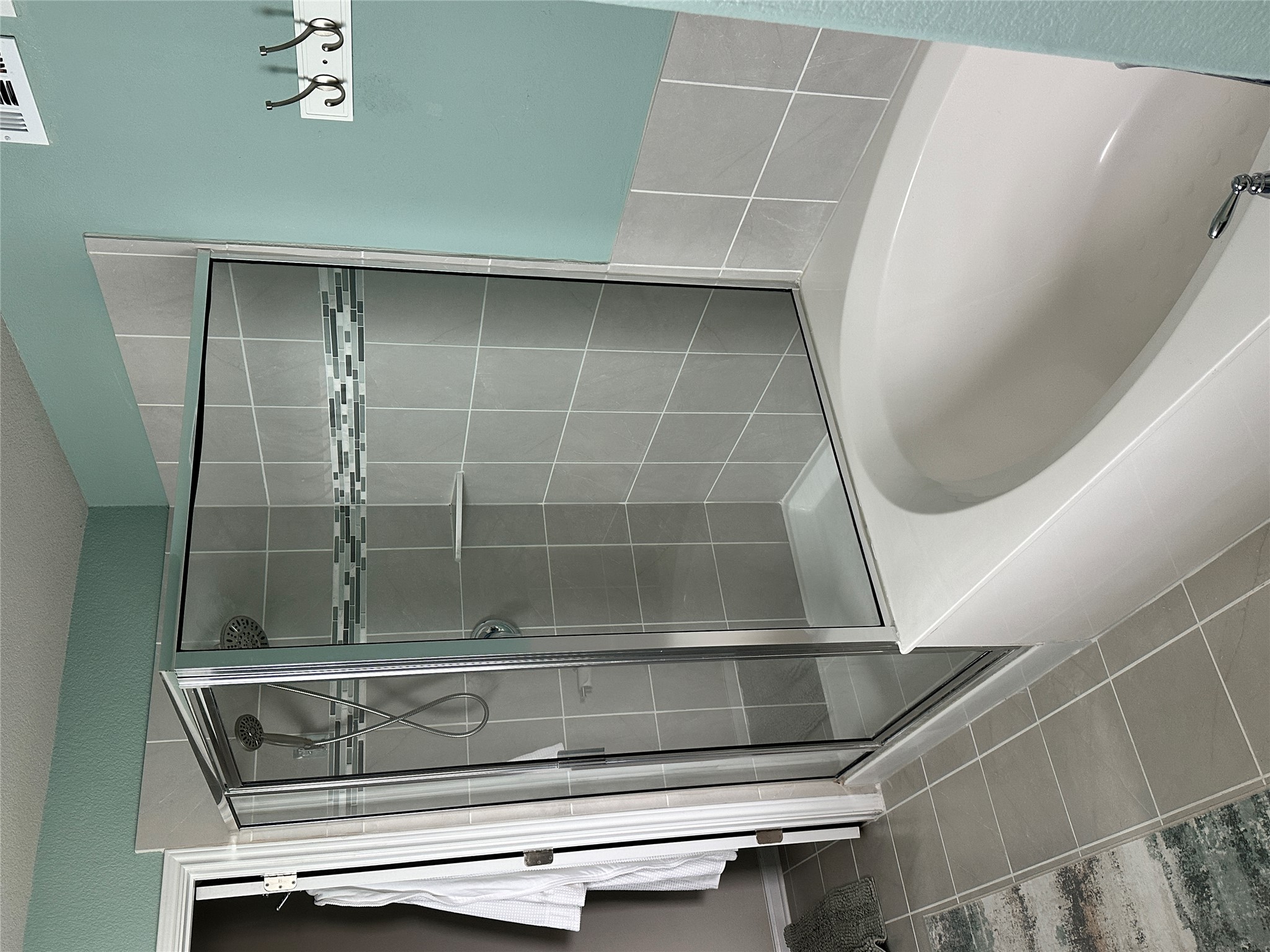 1269 Nevarez Kyle, TX 78640 - Photo 14 of 27 Bathroom with a garden tub, a shower stall, and light tile patterned floors