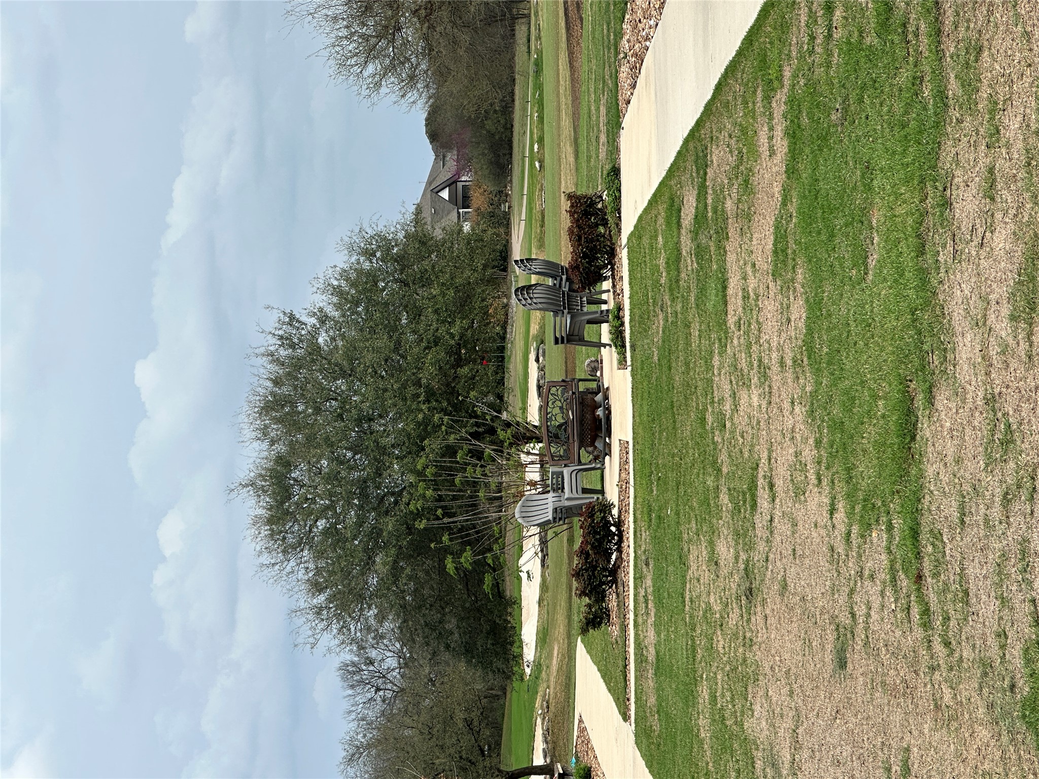1269 Nevarez Kyle, TX 78640 - Photo 2 of 27 View of community with an outdoor fire pit and a patio