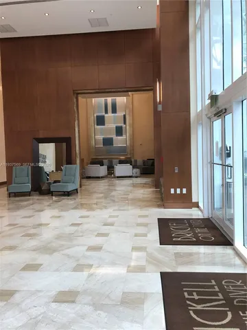 a view of a swimming pool with a lounge chairs