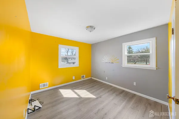 a view of a big room with wooden floor