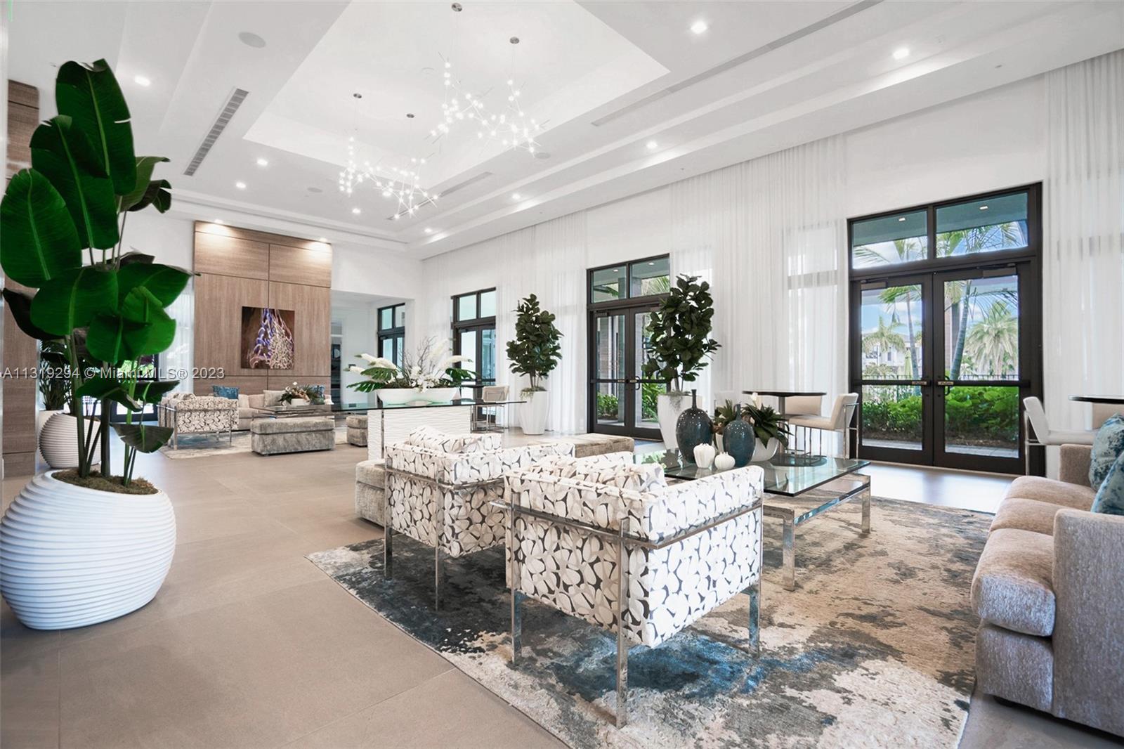 Doral Doral, FL 33166 - Photo 24 of 42 a living room with furniture and a large window