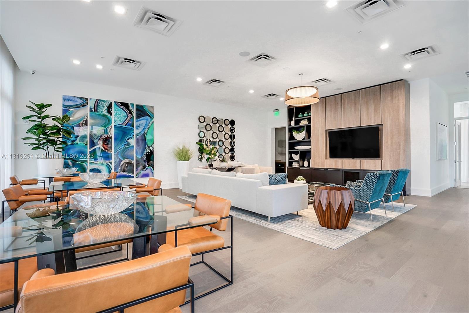 Doral Doral, FL 33166 - Photo 34 of 42 a living room with furniture and a flat screen tv