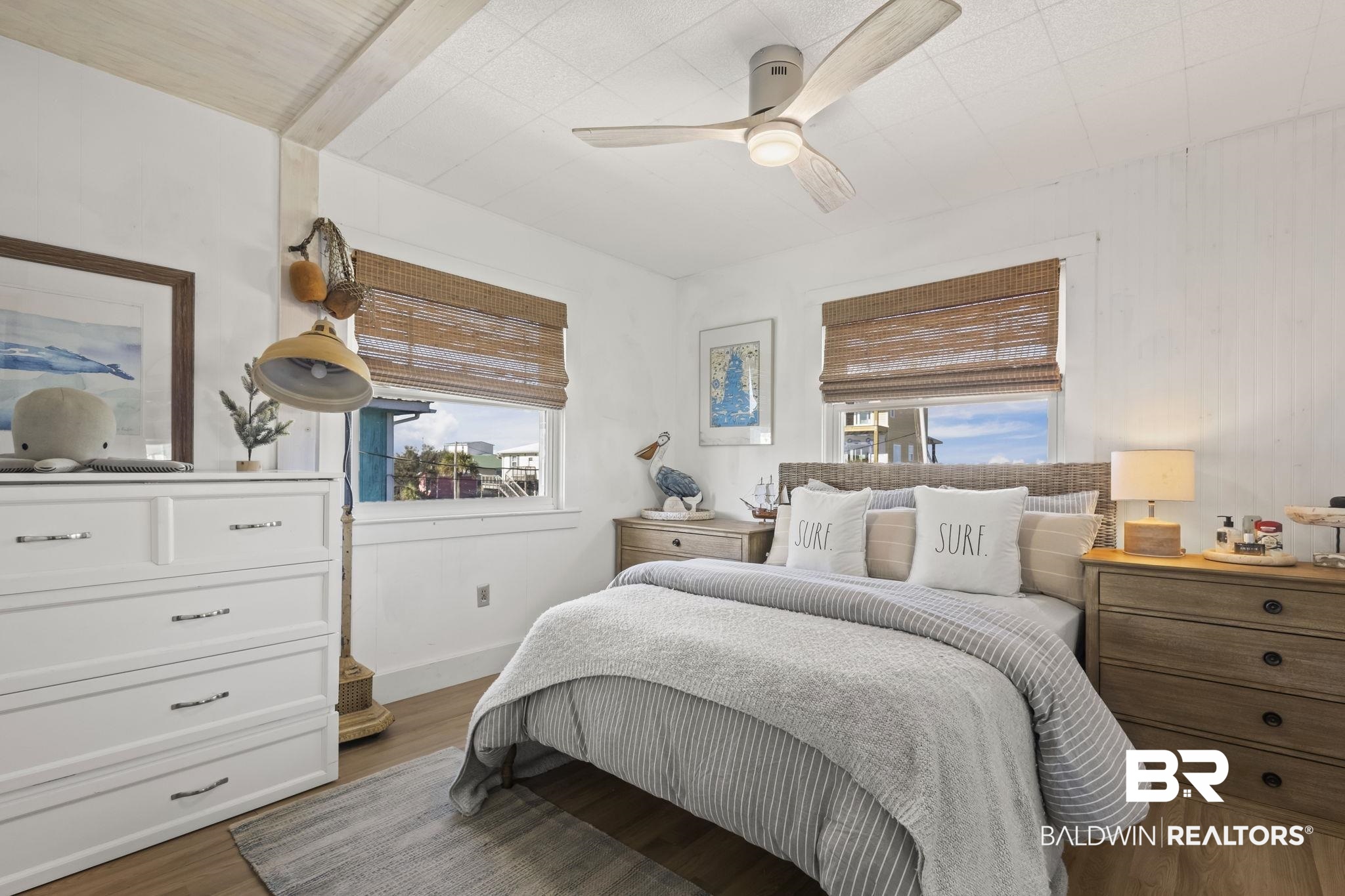 2514 Muscogee Road Gulf Shores, AL 36542 - Photo 23 of 60 Bedroom with hardwood / wood-style flooring, ceiling fan, and multiple windows