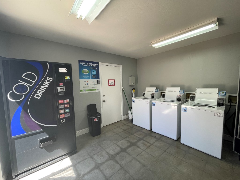 3707 Buffalo Springs Trail, Unit 301 Georgetown, TX 78628 - Photo 14 of 15 Community laundry featuring separate washer and dryer