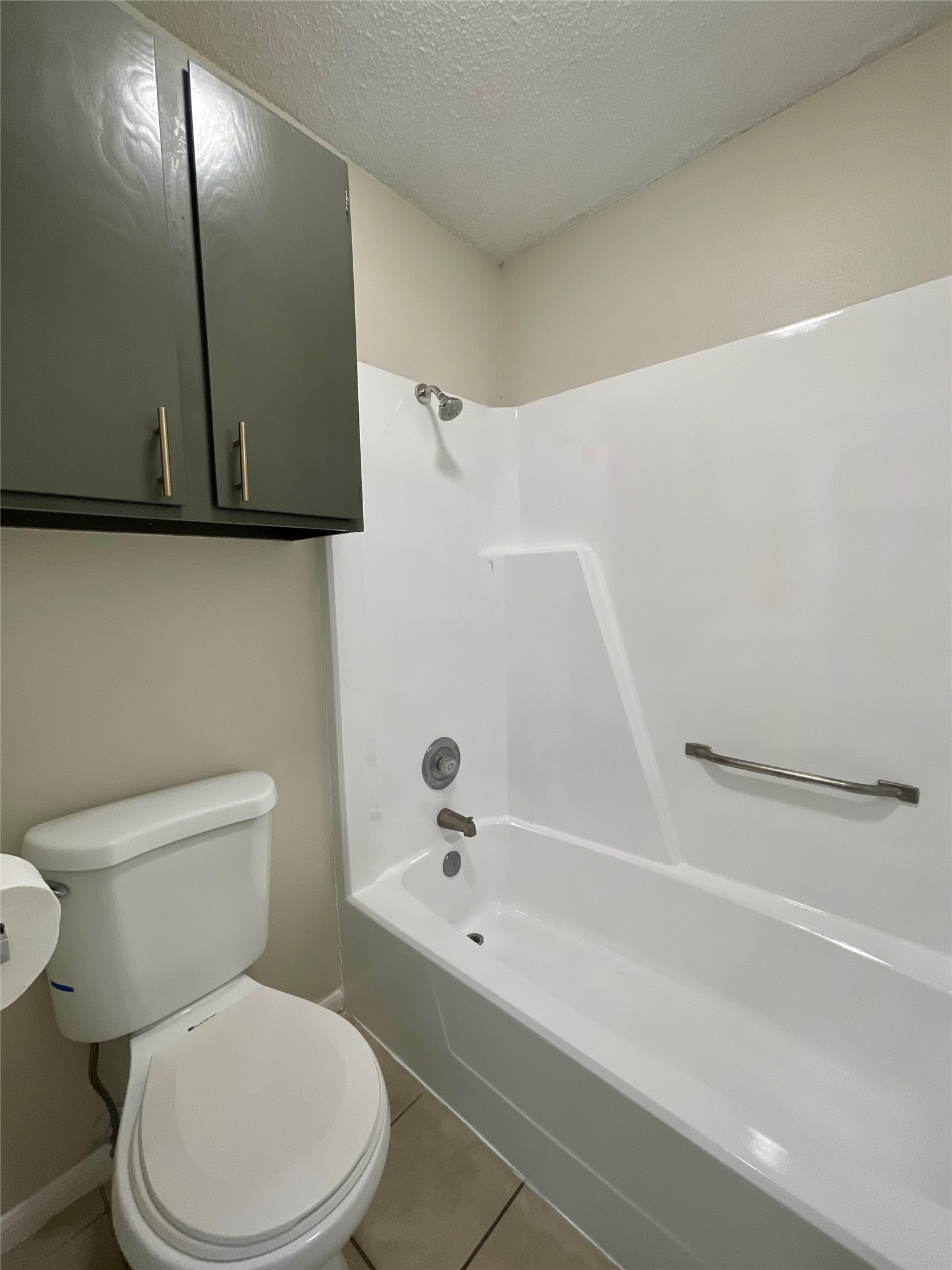 3707 Buffalo Springs Trail, Unit 504 Georgetown, TX 78628 - Photo 10 of 15 a bathroom with a toilet and a shower