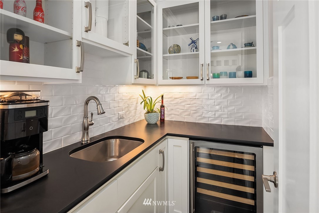 3112 Hunts Point Circle Hunts Point, WA 98004 - Photo 12 of 40 a kitchen with a sink and cabinets