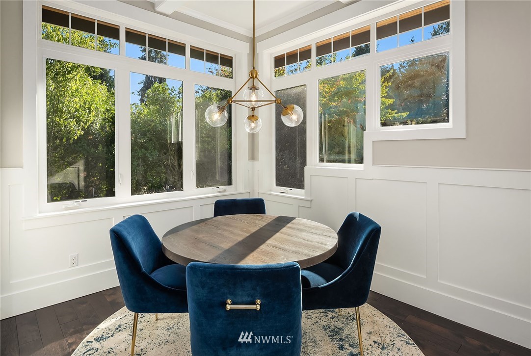 3112 Hunts Point Circle Hunts Point, WA 98004 - Photo 13 of 40 a view of a dining room with furniture window and outside view