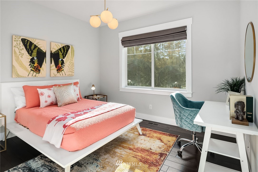 3112 Hunts Point Circle Hunts Point, WA 98004 - Photo 24 of 40 a bedroom with a bed and window