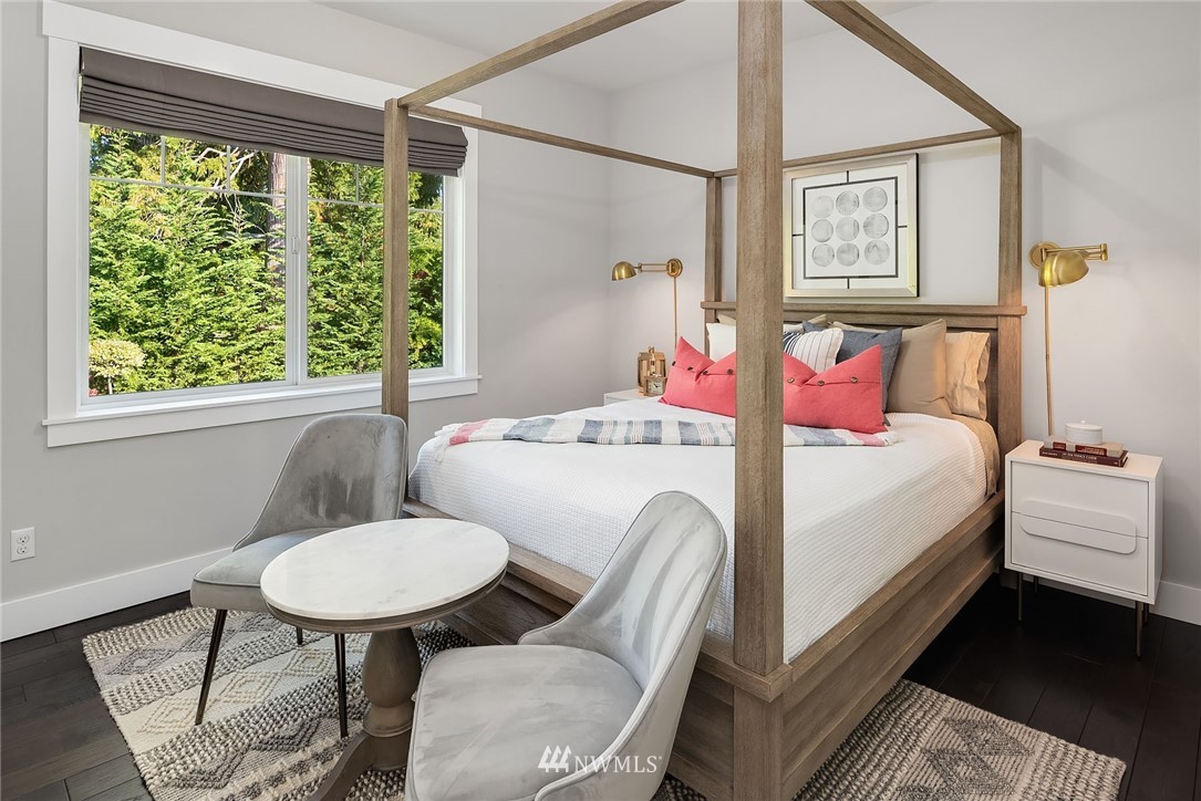 3112 Hunts Point Circle Hunts Point, WA 98004 - Photo 25 of 40 a bedroom with a bed and a table