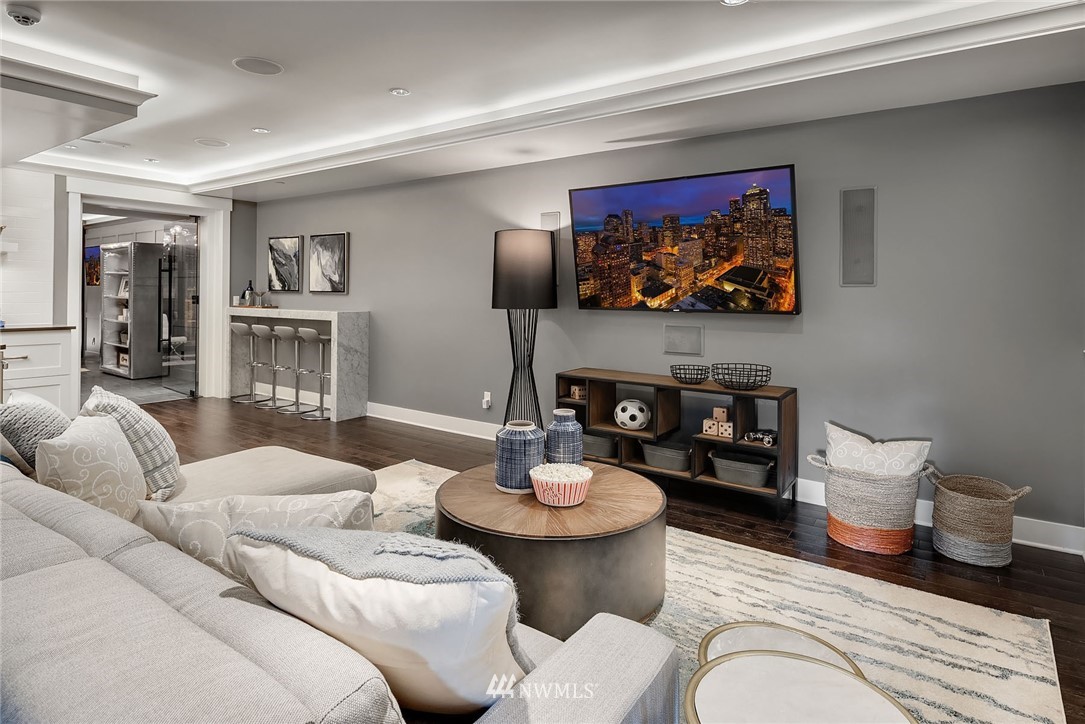 3112 Hunts Point Circle Hunts Point, WA 98004 - Photo 28 of 40 a living room with furniture and wooden floor