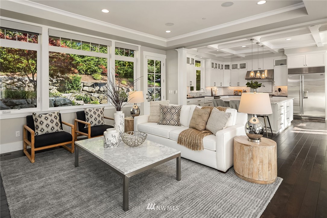3112 Hunts Point Circle Hunts Point, WA 98004 - Photo 6 of 40 a living room with furniture and a large window