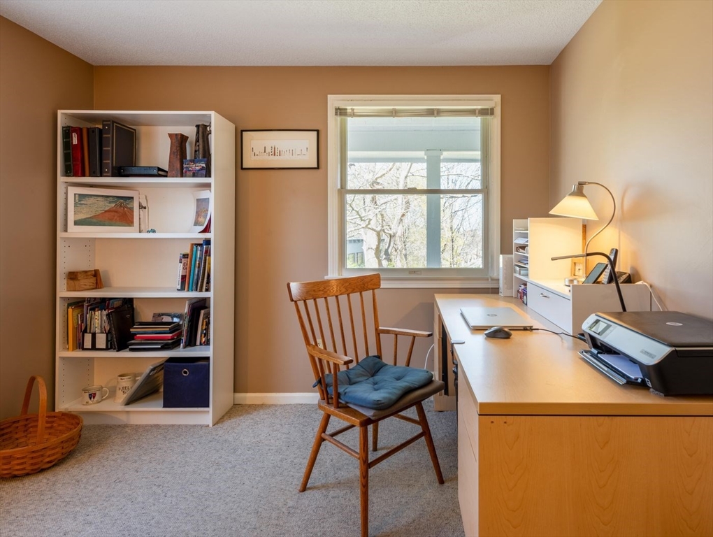 4 Graystone Road Gloucester, MA 01930 - Photo 18 of 34 a view of a workspace with furniture and a window