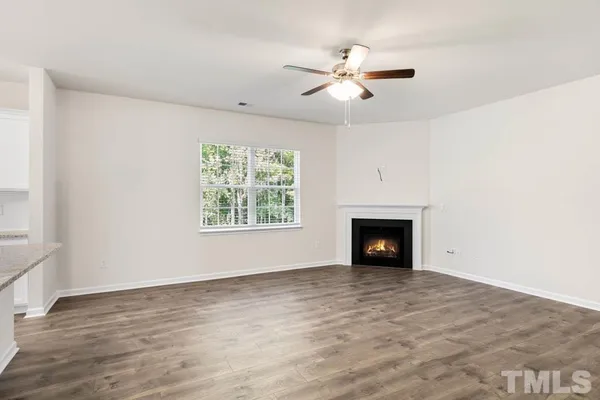 a kitchen with a sink stove and microwave