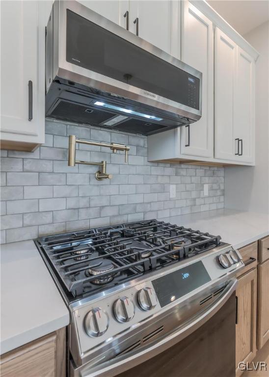 150 Mauch Chunk Road Whitehall, PA 18052 - Photo 15 of 43 Gas Stove w/elegant articulated pot filler faucet