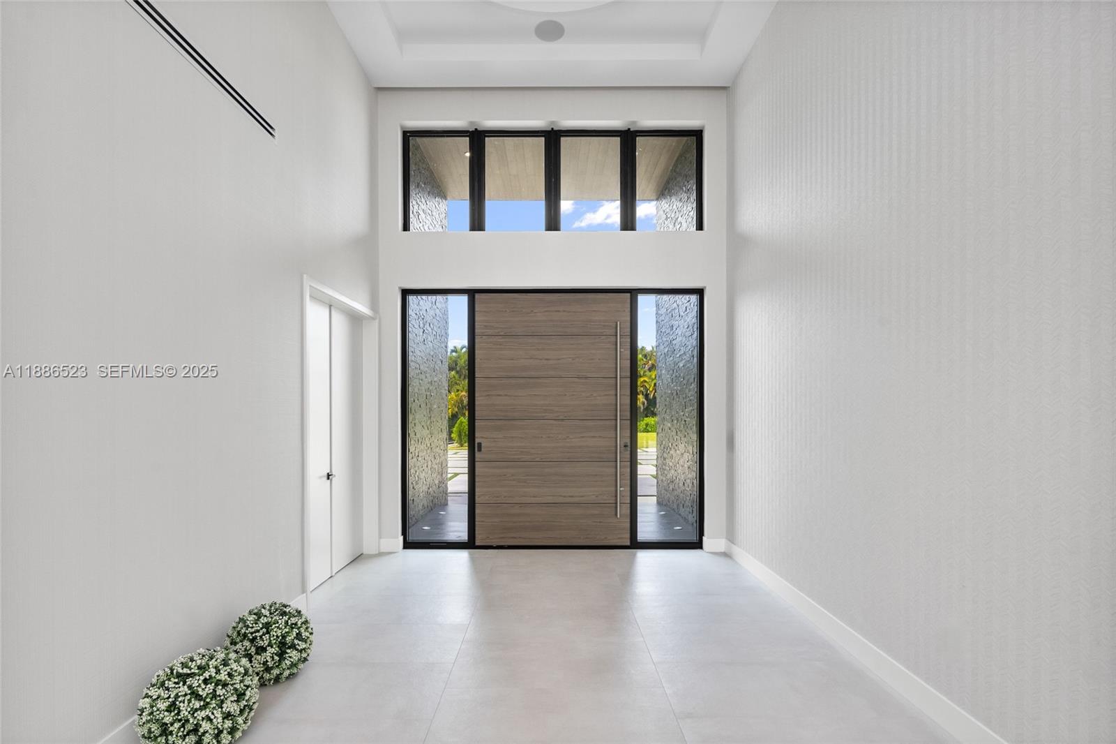 17301 Southwest 52nd Court Southwest Ranches, FL 33331 - Photo 11 of 47 a view of an entryway door