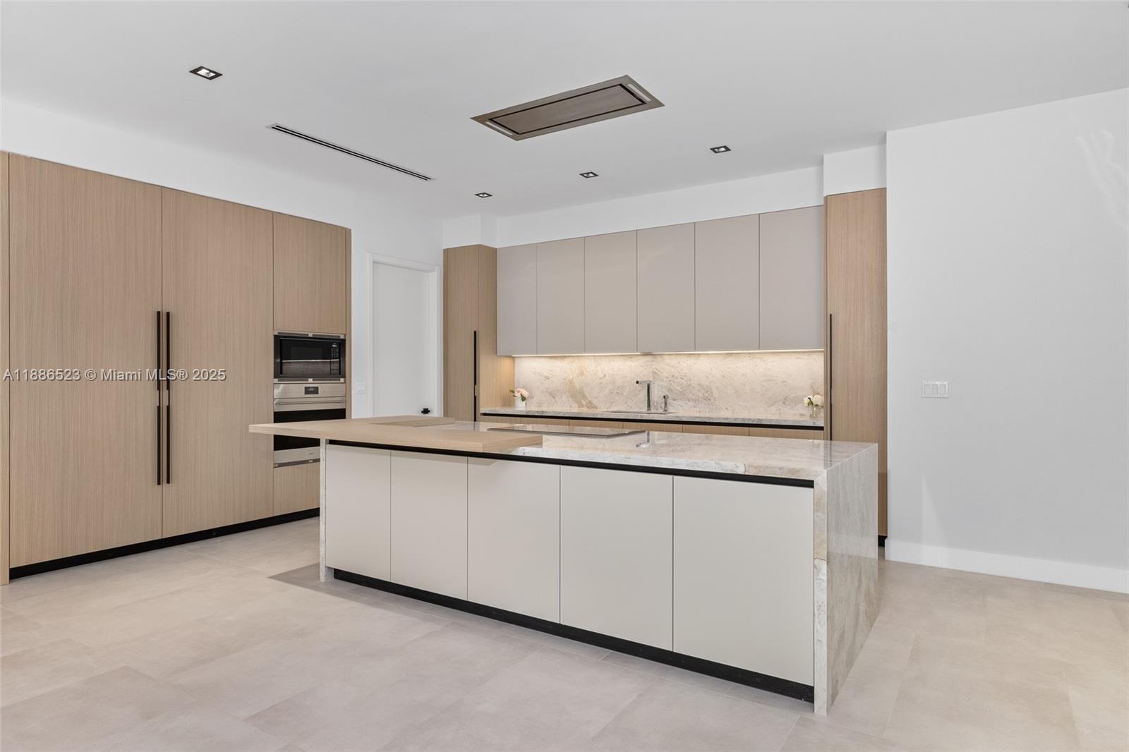 17301 Southwest 52nd Court Southwest Ranches, FL 33331 - Photo 12 of 47 a kitchen with granite countertop white cabinets and white appliances