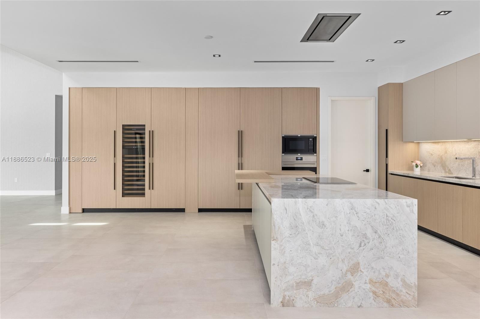 17301 Southwest 52nd Court Southwest Ranches, FL 33331 - Photo 17 of 47 a living room with a flat screen tv and a couch