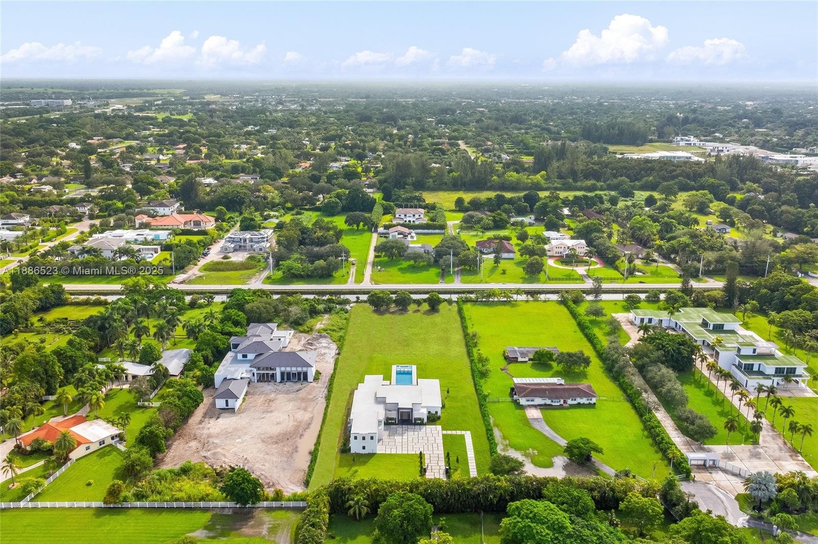 17301 Southwest 52nd Court Southwest Ranches, FL 33331 - Photo 2 of 47 an aerial view of residential houses with outdoor space