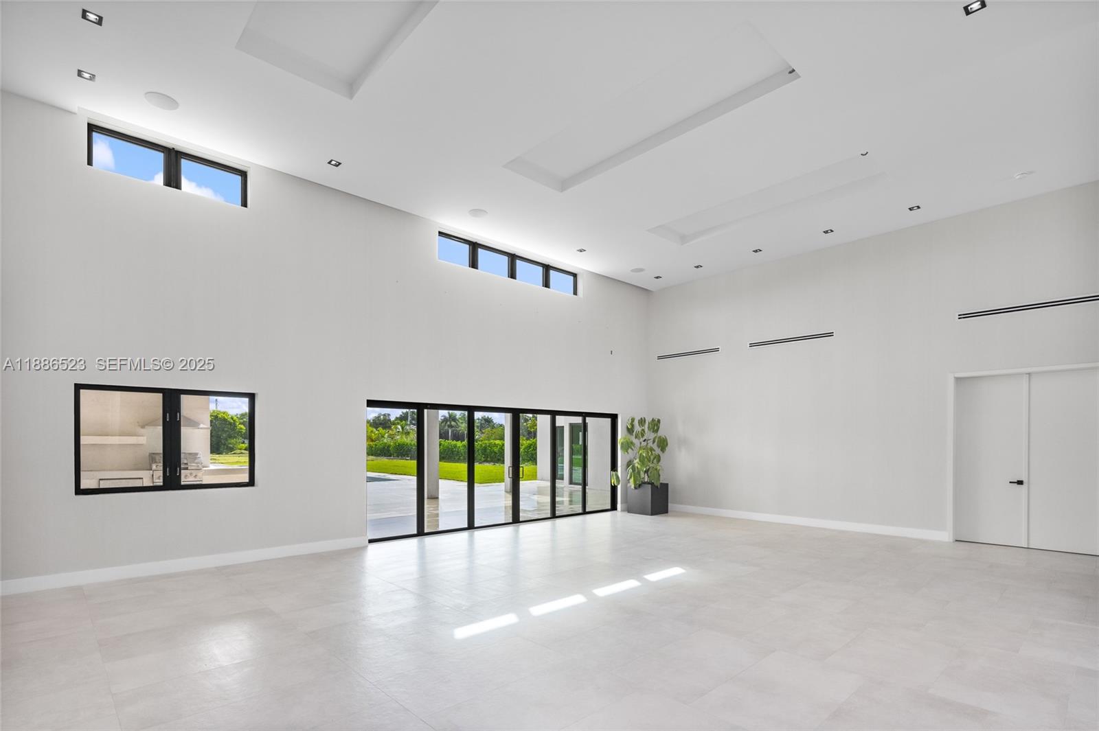 17301 Southwest 52nd Court Southwest Ranches, FL 33331 - Photo 22 of 47 a view of an empty room with a window