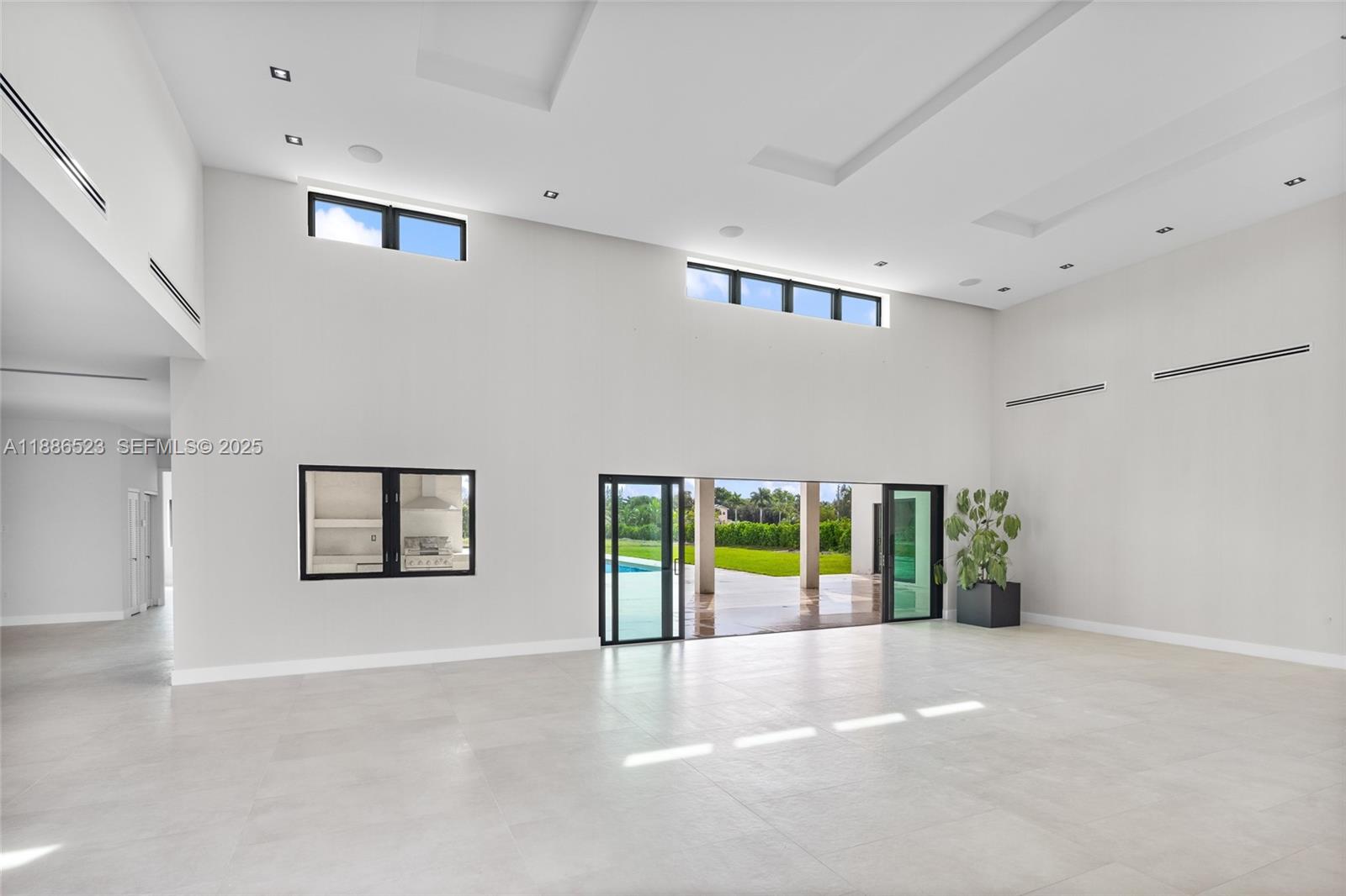 17301 Southwest 52nd Court Southwest Ranches, FL 33331 - Photo 23 of 47 a view of an empty room with a window