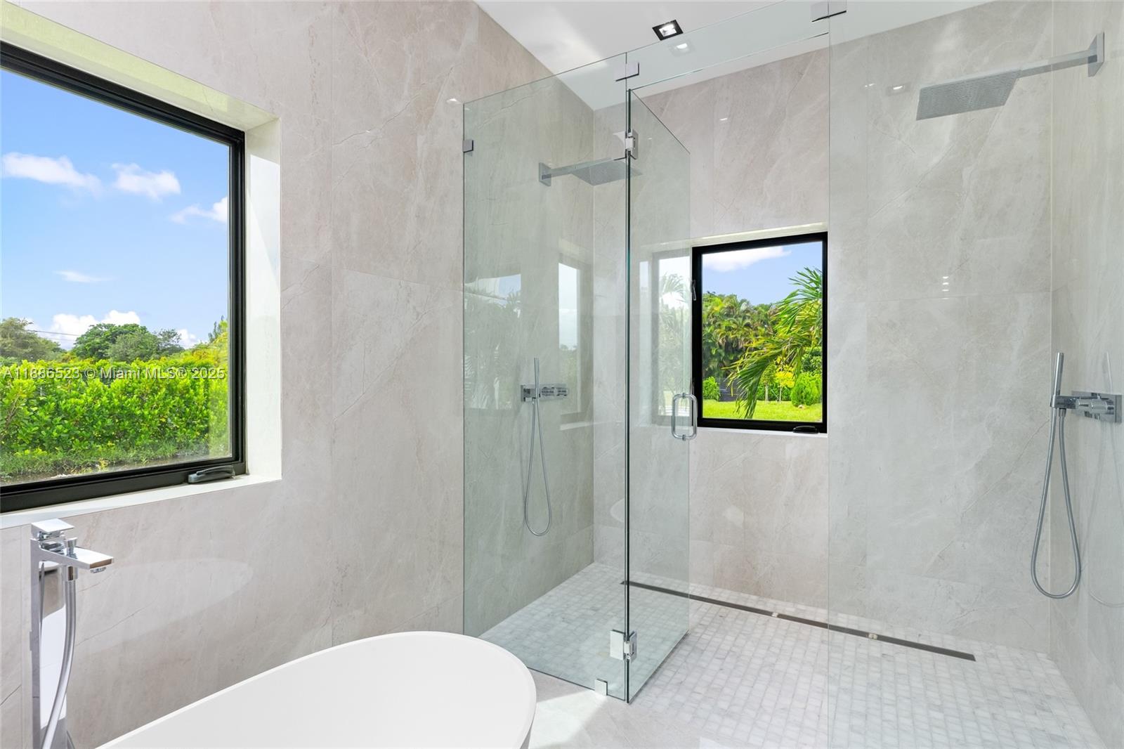 17301 Southwest 52nd Court Southwest Ranches, FL 33331 - Photo 30 of 47 a bathroom with a toilet and a shower