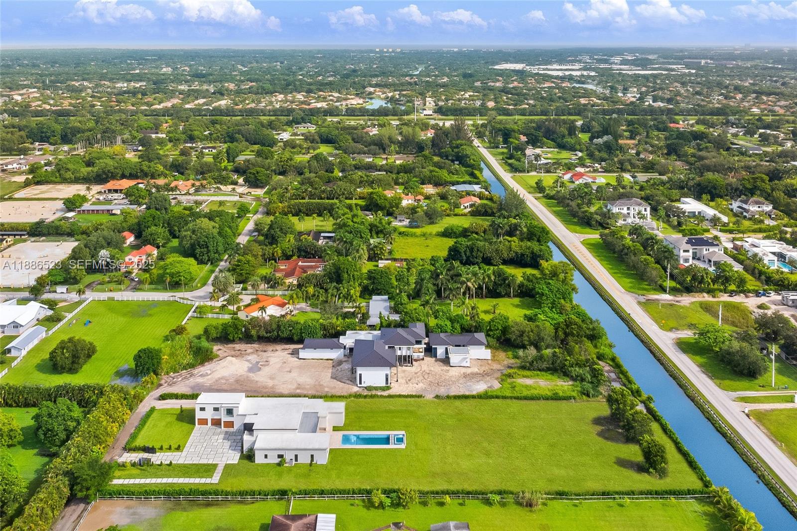 17301 Southwest 52nd Court Southwest Ranches, FL 33331 - Photo 3 of 47 a view of a city