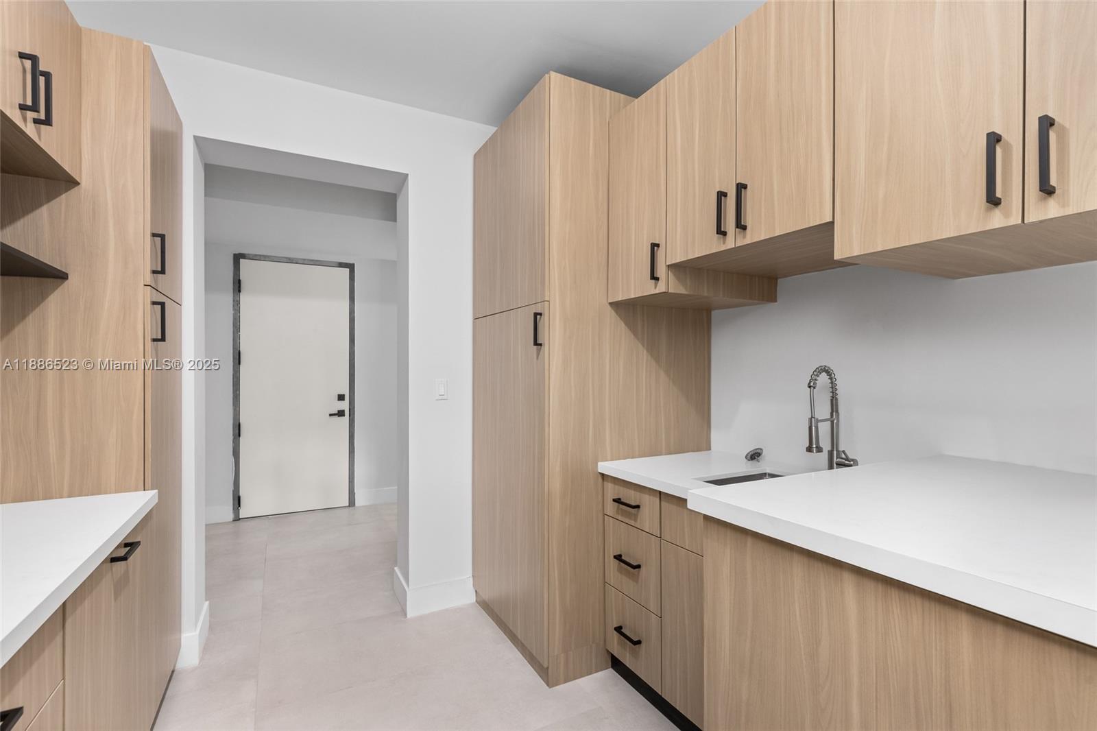17301 Southwest 52nd Court Southwest Ranches, FL 33331 - Photo 36 of 47 a bathroom with a sink and a mirror
