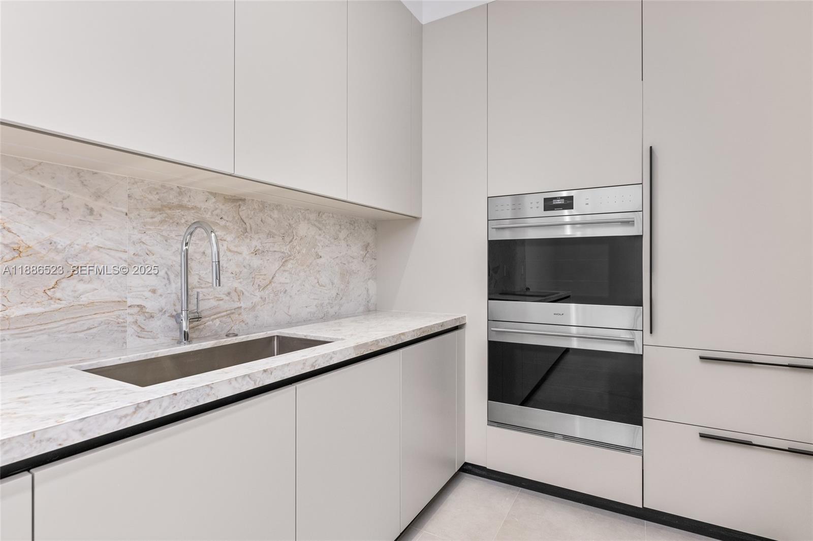 17301 Southwest 52nd Court Southwest Ranches, FL 33331 - Photo 40 of 47 a close view of washer and dryer