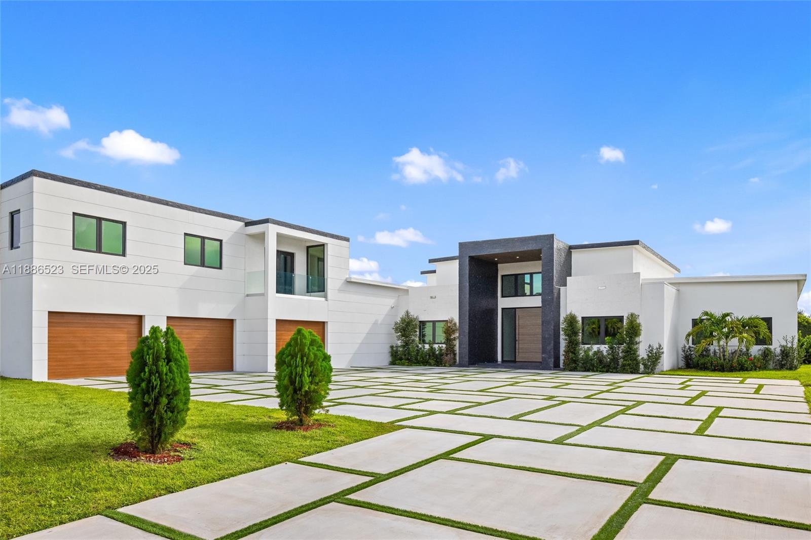 17301 Southwest 52nd Court Southwest Ranches, FL 33331 - Photo 7 of 47 a view of a house with a patio
