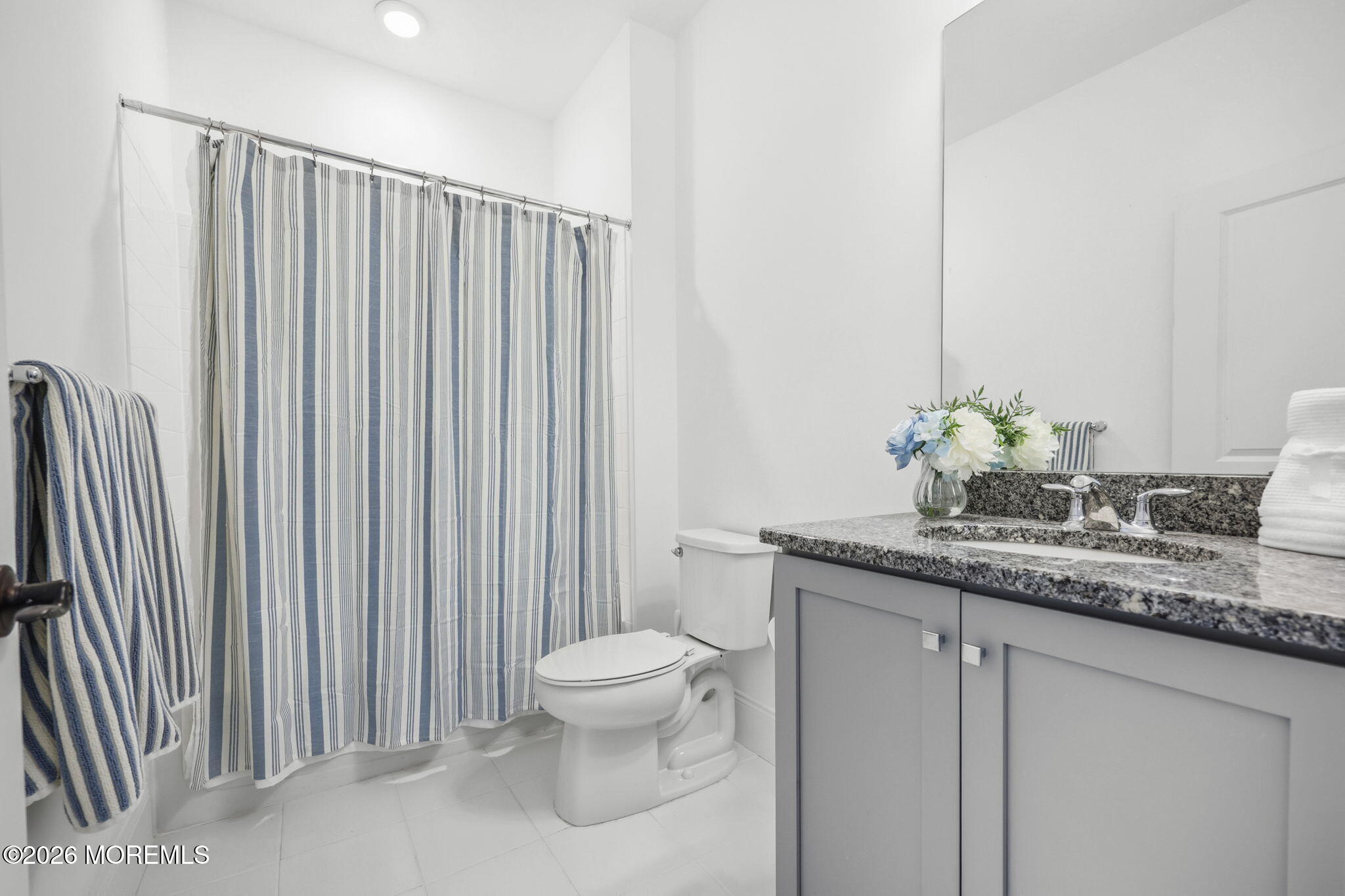66 Windermere Road Lincroft, NJ 07738 - Photo 27 of 48 a bathroom with a granite countertop sink and a toilet