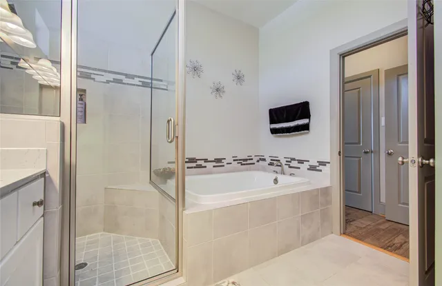 a bathroom with double sink and a mirror