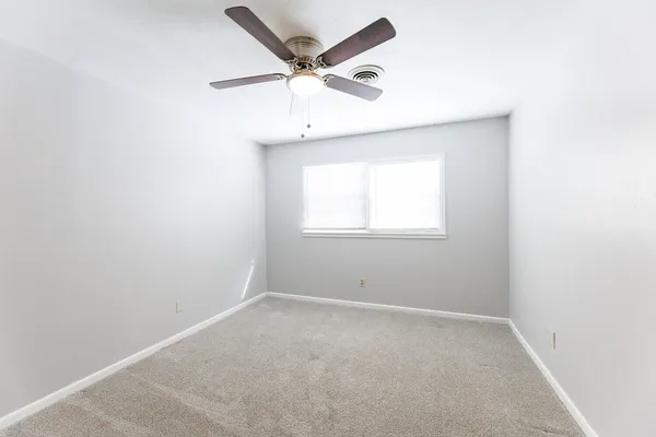 a bathroom with a sink vanity and a mirror