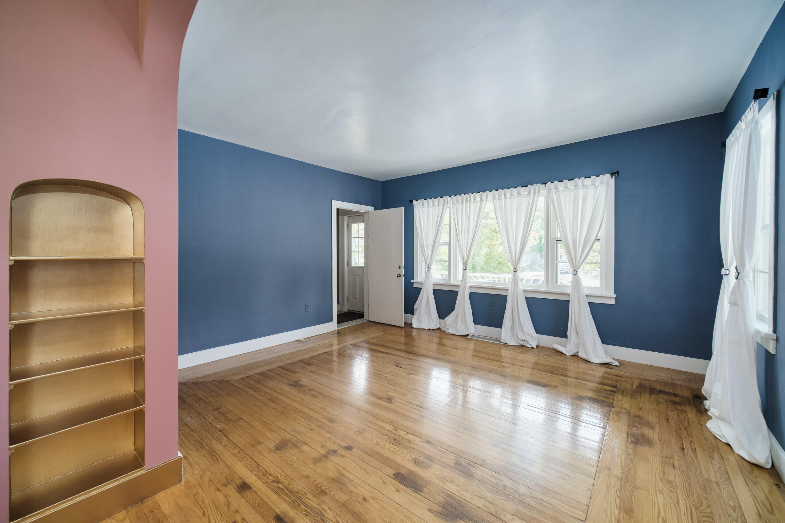 244 5th Street Manistee, MI 49660 - Photo 8 of 45 Living room has southern exposure