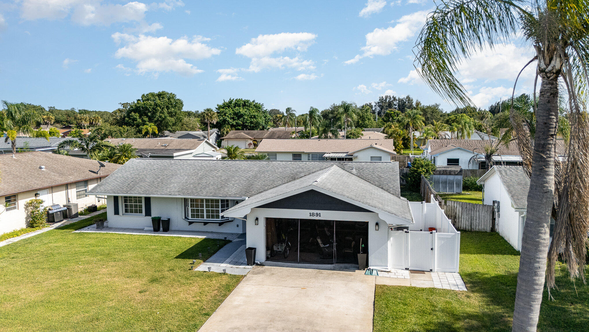 1891 Tallpalm Road Melbourne, FL 32935 - Photo 4 of 28 005_dji_20240726165351_0002_d-edit