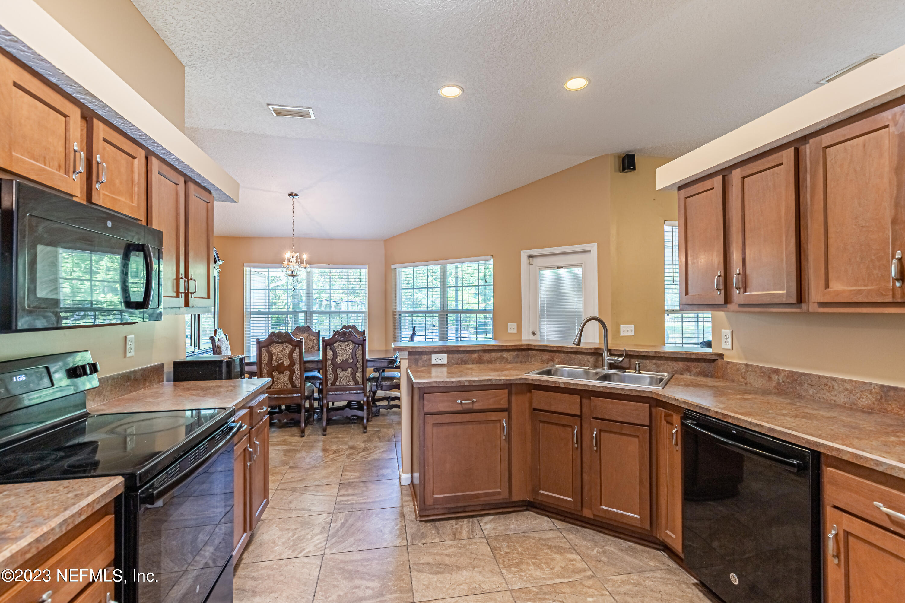 1094 Cactus Cut Road Middleburg, FL 32068 - Photo 12 of 32 a kitchen with lots of counter top space