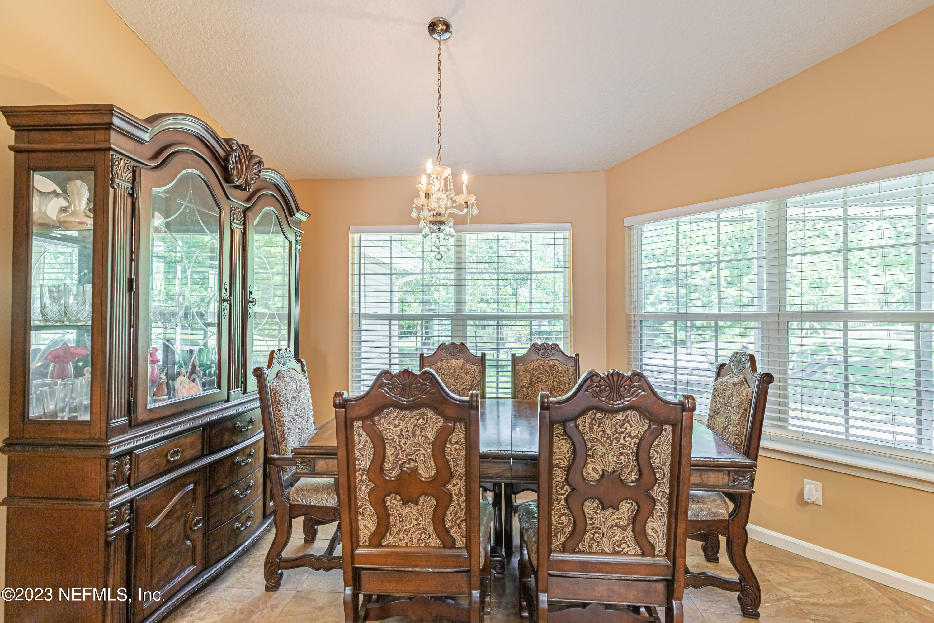 1094 Cactus Cut Road Middleburg, FL 32068 - Photo 14 of 32 a view of a dining room with furniture window and outside view